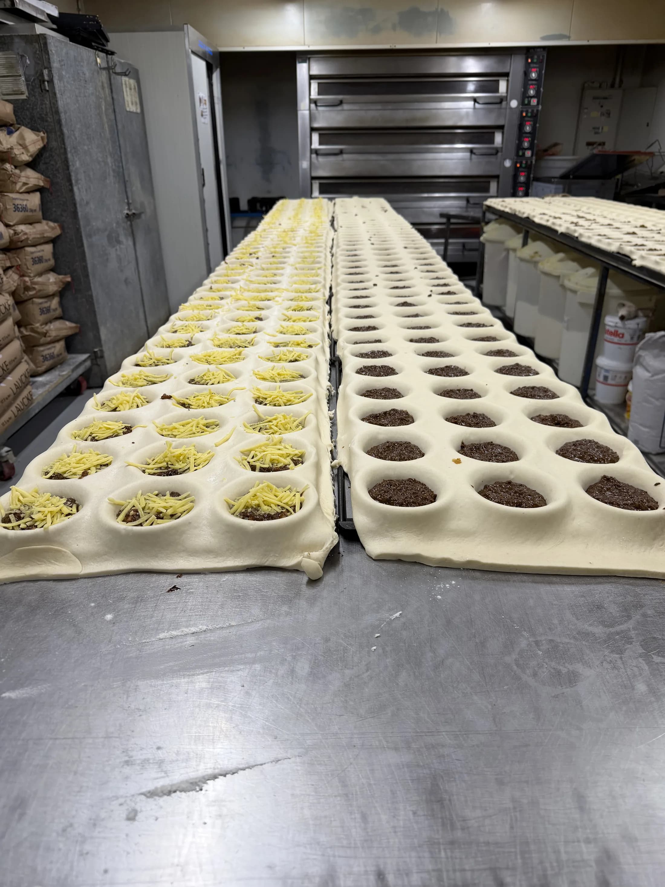 Trays of pies hand-filled fresh in the Kipling's Bakery kitchen